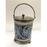 A Doulton Lambeth biscuit barrel by Frank Butler d