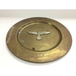 A WW2 Waffen SS decorative wall plate, approx diam