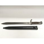 A WW1 German butcher bayonet and scabbard.