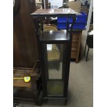 An Edwardian display cabinet with interior glass s