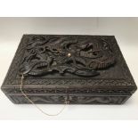 19th century carved Chinese box with a dragon on l