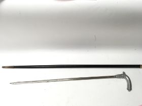 A sheathed sword stick.