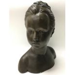 A sculpture of a bust of a girl.