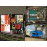 A collection of fishing rods and three cases of re