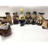 A collection of seven royal Doulton character jugs