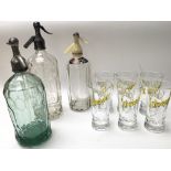 Six Schweppes branded drinking glasses, and three