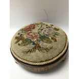 A Victorian inlaid walnut upholstered circular foo