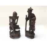 Two old carved possibly Japanese figures