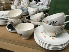 A decorative Wade ceramic tea set and a Doulton Sp