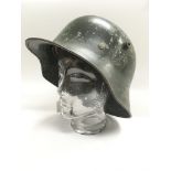 A transition period German M17 helmet. A large amo