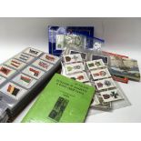 A mixed collection of cigarette cards.