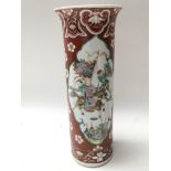 A pretty Chinese vase decorated with flowers and f