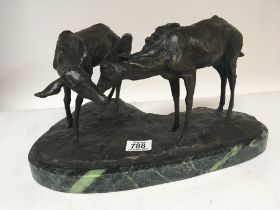 WITHDRAWN - A 20th century bronze in the form of two Fallow de