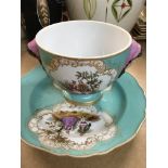 A 19 th century Meissen bowl and saucer with raise