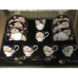 A cased Royal Stafford tea set with spoons, cups a