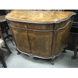 A Weiring & Gillows inlaid walnut cabinet with a s