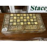 An inlaid games board and accessories - NO RESERVE