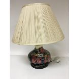 A modern Moorcroft lamp tubeline decorated with fl