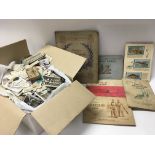 Cigarette card albums and a large quantity of loos