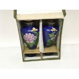 A pair of 20th century cloisonné vases decorated w