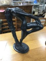 An Art Deco style bronzed figure of a nude maiden,