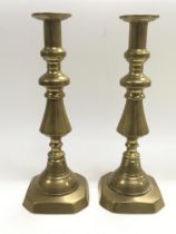 A pair of Victorian brass candlesticks, approx 30.