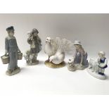 A collection of ceramics including two Lladro figu