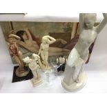 A blanc de chine figural table lamp of a female nude, two female alabaster figures of ladies, a pair