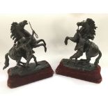 A pair of bronze Marley horses and handlers, after