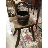 An oak stool and a wooden bucket.