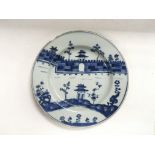 A blue and white plate depicting part of The Great