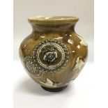 A Doulton Lambeth vase of ovoid form and decorated