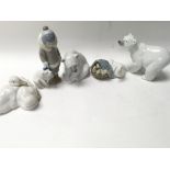 Four small Lladro figures including three Polar Be