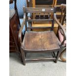 An early oak spindle back carver chair, a gilt wood lyre back bedroom chair, a high back elm chair