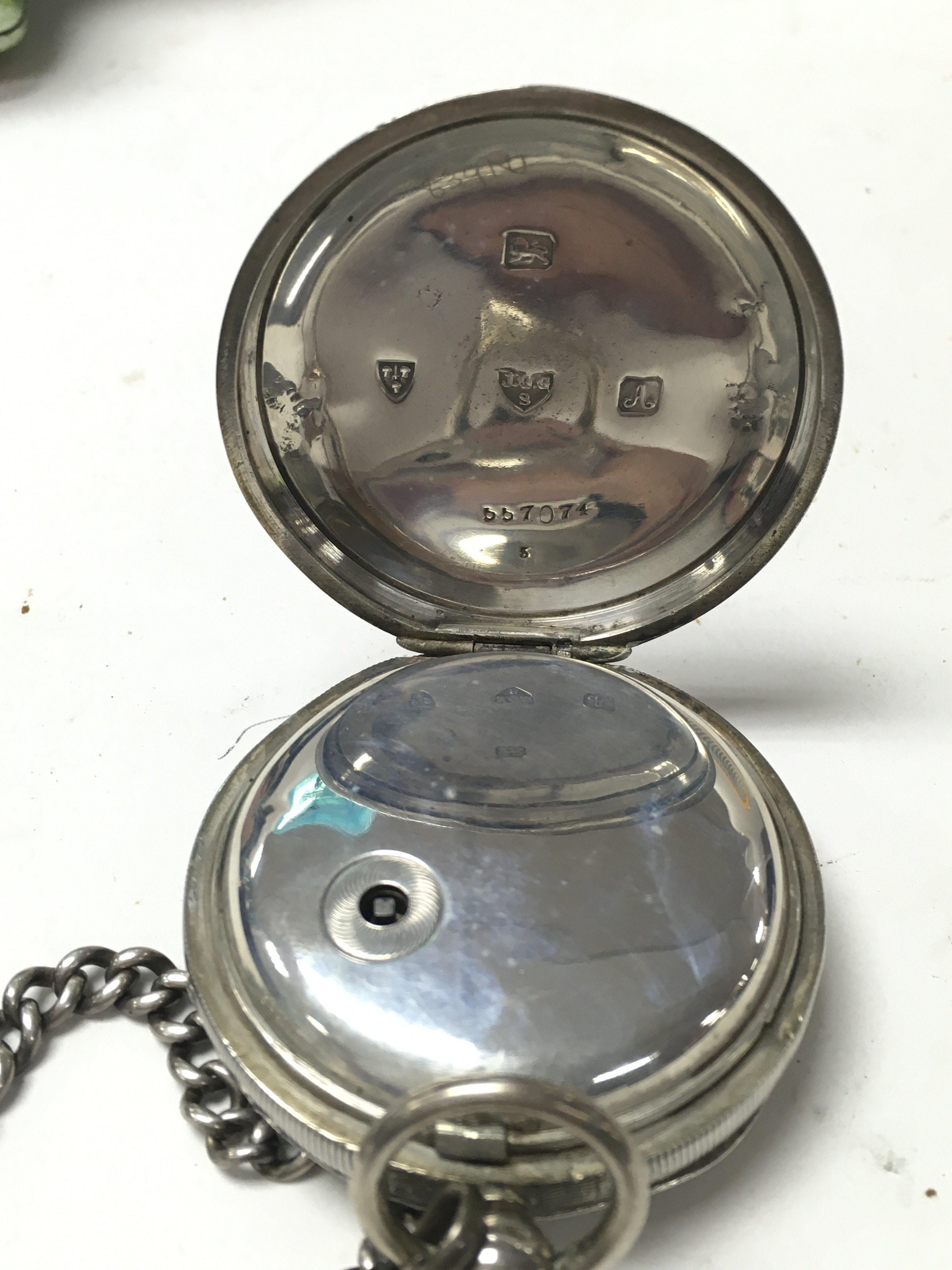 A silver pocket watch with heavy silver chain, cir - Image 2 of 2