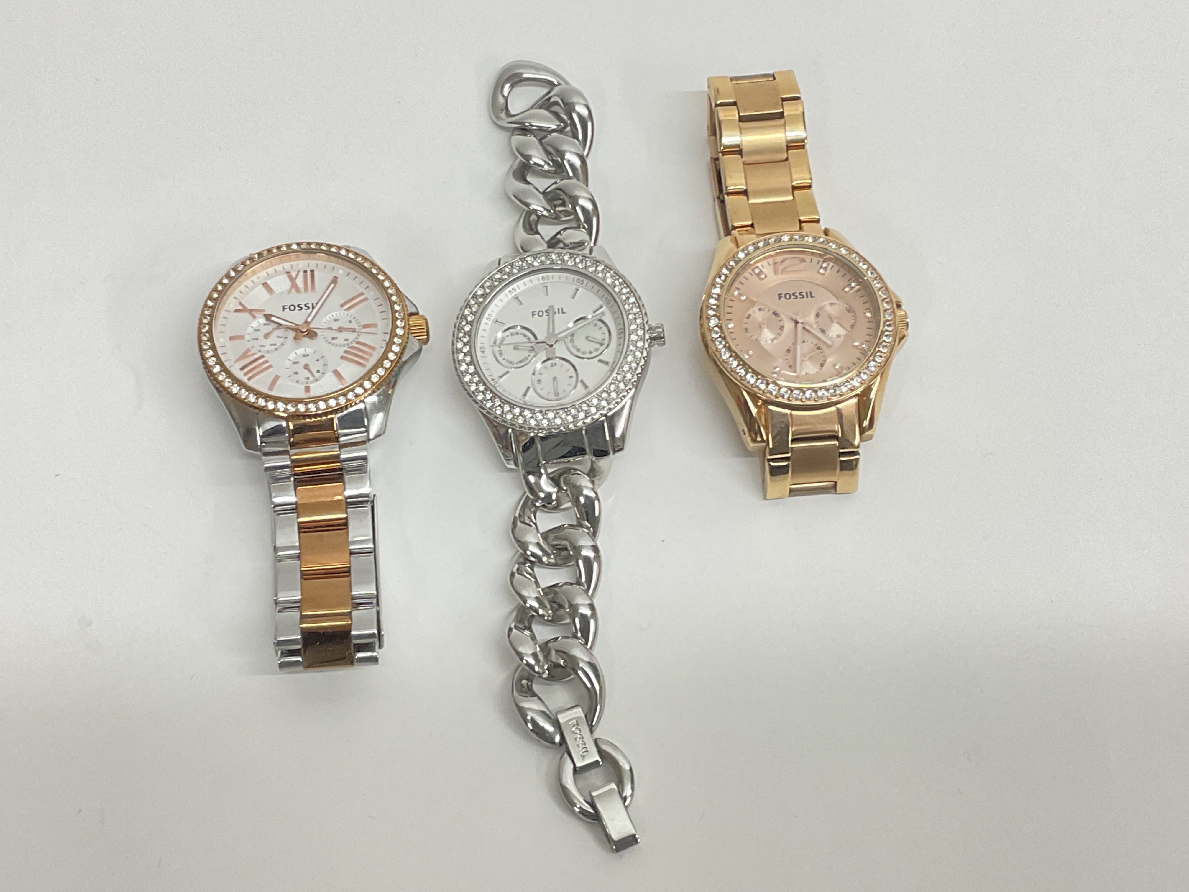 Three fashion Fossil watches