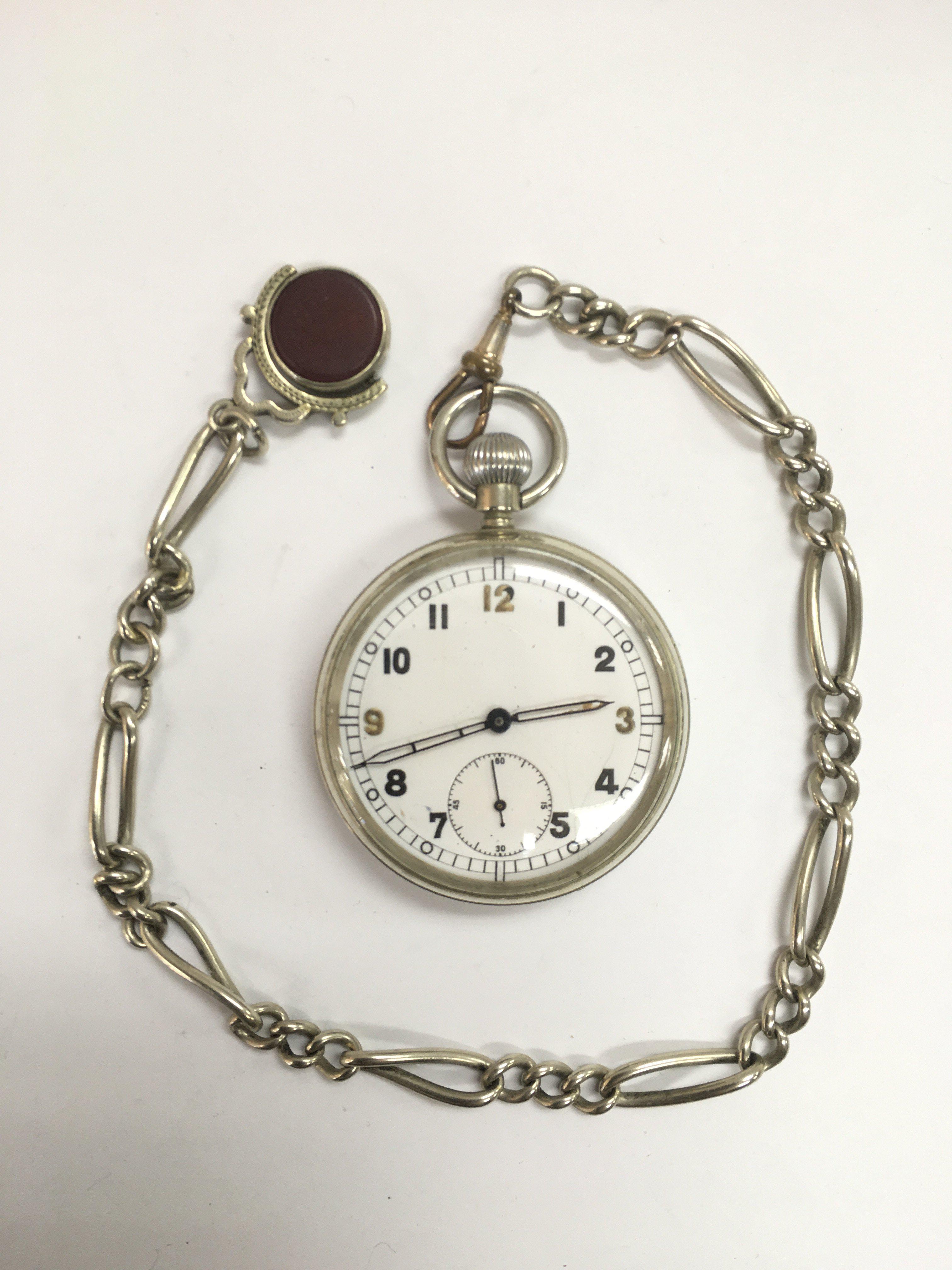 A gents open face pocket watch with Albert chain a