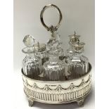 A 6 bottle cruet set hallmarked silver within a si