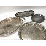 Four silver plated trays and dishes.