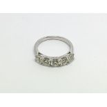 A 14ct white gold five stone diamond ring. RBC dia