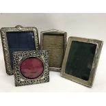 Four Edwardian and later silver photo frames
