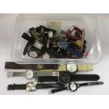A plastic tub of mixed watches.