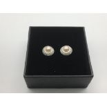 A pair of boxed peach / off white pearl and diamon