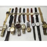 A collection of 19 vintage mens watches.