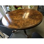A Victorian inlaid walnut loo table and six balloo