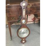 A Victorian rosewood cased mercury tubed barometer