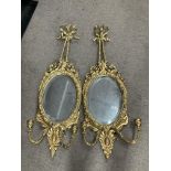 Two early gilt regency style period mirrors with built in candle sconces.