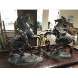 A pair of large spelter Marley horses and handlers