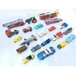 A collection of playworn vehicles including Dinky