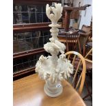 A large carved alabaster centrepiece/ table lamp (some small pieces missing). 63cm.
